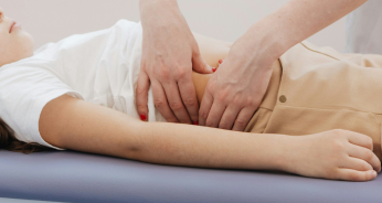 women undergoing massage on hip