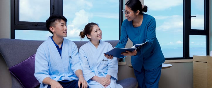 nurse showing packages to patient