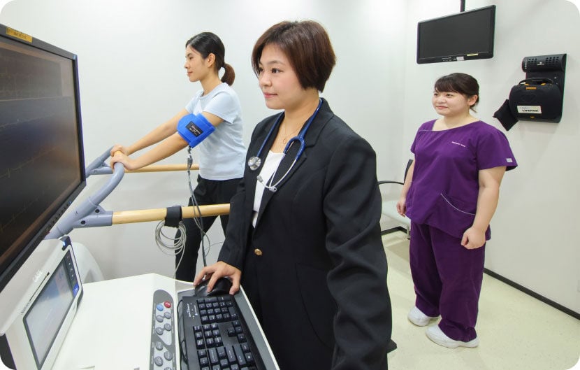 woman doing treadmill test